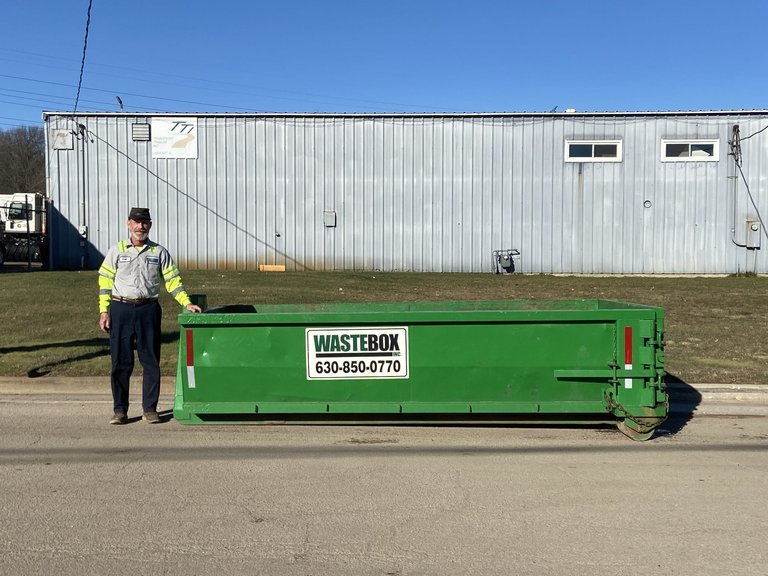 6 yard roll-off dumpster from WasteBox, the size rated for concrete, brick and dirt